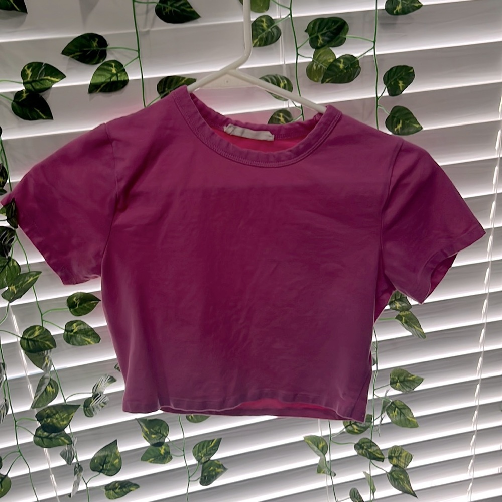 a pink crop top